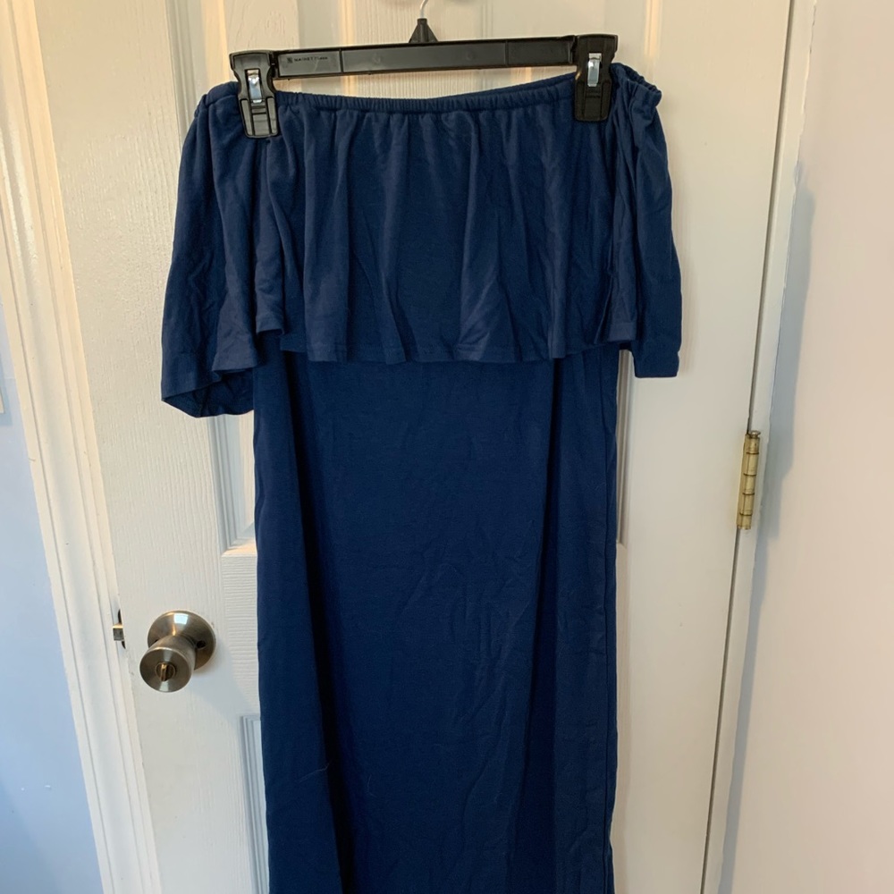 Navy blue dress with ruffled top.
